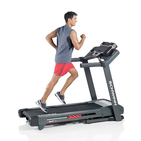 A young men running on Schwinn 830 Treadmill