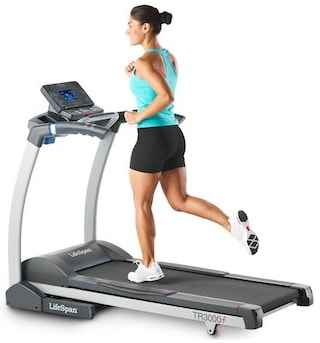 A girl running on LifeSpan TR 3000i Treadmill